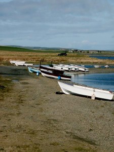 Fishing boats on the shore of the Loch of Harray, Orkney