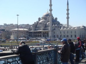 People fishing off Galata Bridge in Bodrum, Turkey