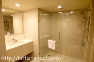 Bathroom and walk-in shower at the President Palace Hotel