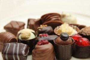 Luxury Belgian chocolate pralines, decorated with fruits and nuts