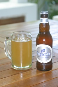 A glass and a bottle of Hoegaarden wheat beer